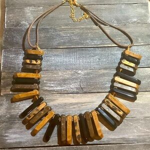 Brown wood Necklace. Some glass beads and gold accents